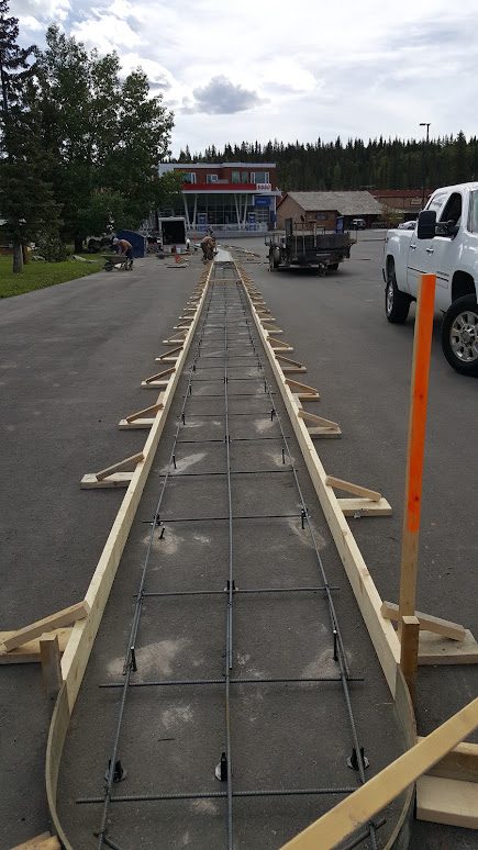 Rebar grid inside long sidewalk forms
